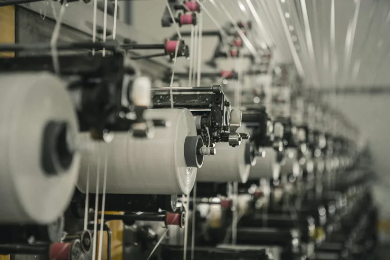 Textile fabric machinery — illustrative material atmosphere image